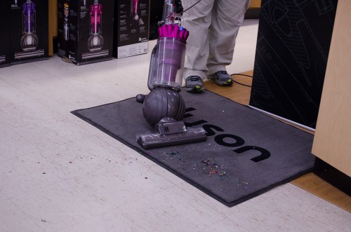 Dyson Animal Complete vacuum working on confetti