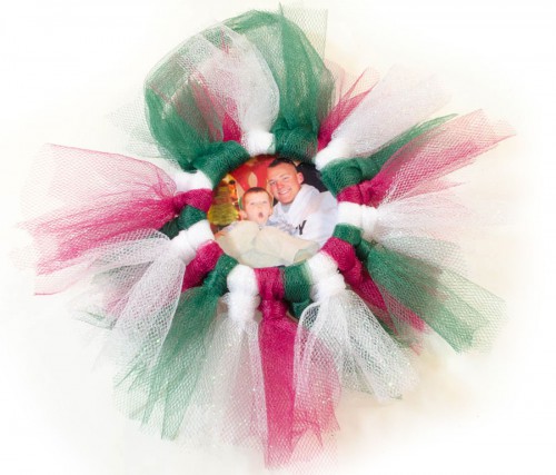 Red, white, and green tulle adorn this Tulle Wreath Photo Frame ornament!