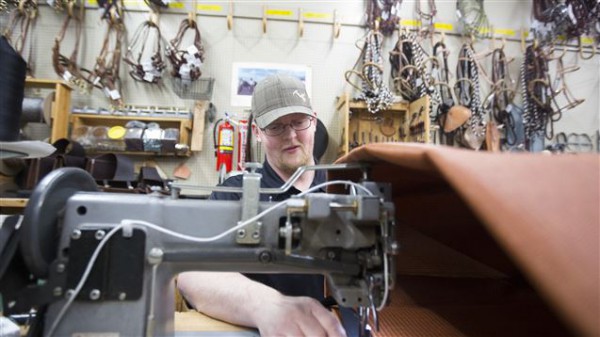 Tom making pack bags here in our workshop (photo by Briana Scroggins, Standard-Examiner)