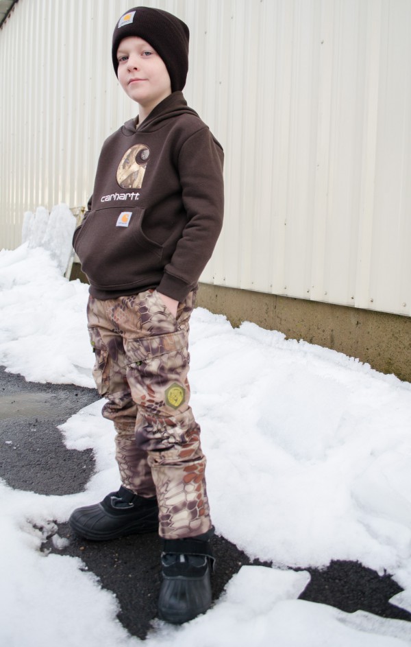 Sam with boys' camo pants and Carhartt brown hoodie