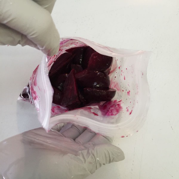 Putting fresh cooked beets in freezer bags
