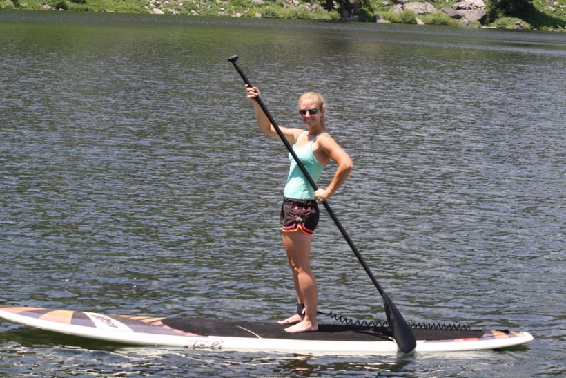 Merrill's daughter paddleboarding