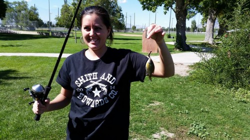 Bekah and her fish at the Brigham Community Pond