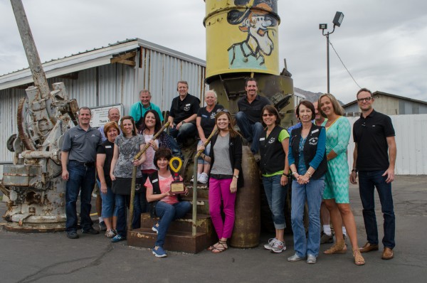 Ace representatives and Smith & Edwards staff with the Ace Foundation trophy