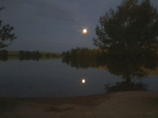 Lake shore at dusk in Idaho where Travis went fishing